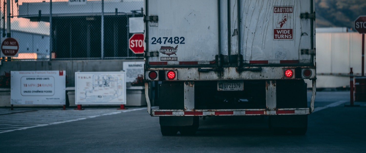 white-freight-truck-close-up-photography-2449454