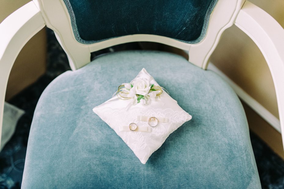 wedding rings on ring pillow