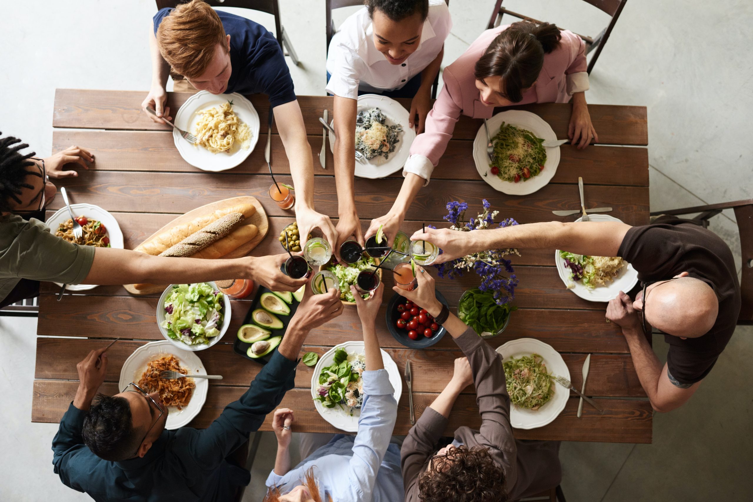 group-of-people-making-toast-3184183