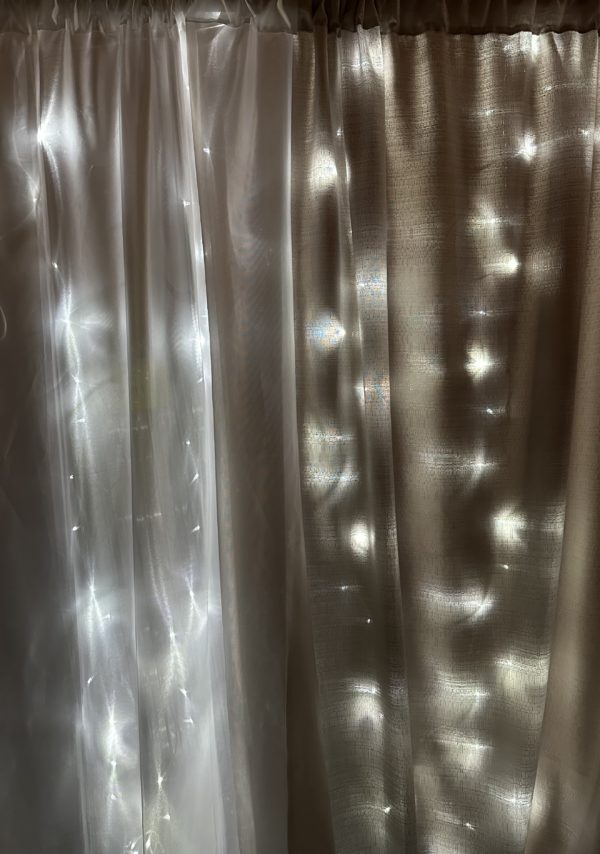 sheer drape vs silver banjo drape with LED lights dark room